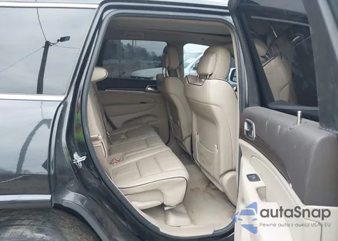 2014 Jeep Grand Cherokee Overland z USA, uszkodzony, nr VIN 1C4RJECM0EC300286